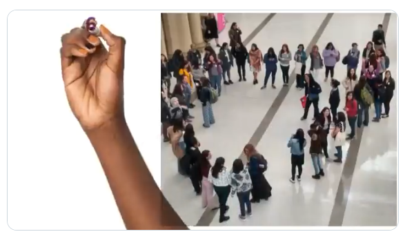 R-Ladies members at LatinR 2019 standing together in a formation that accidentally creates a heart shape