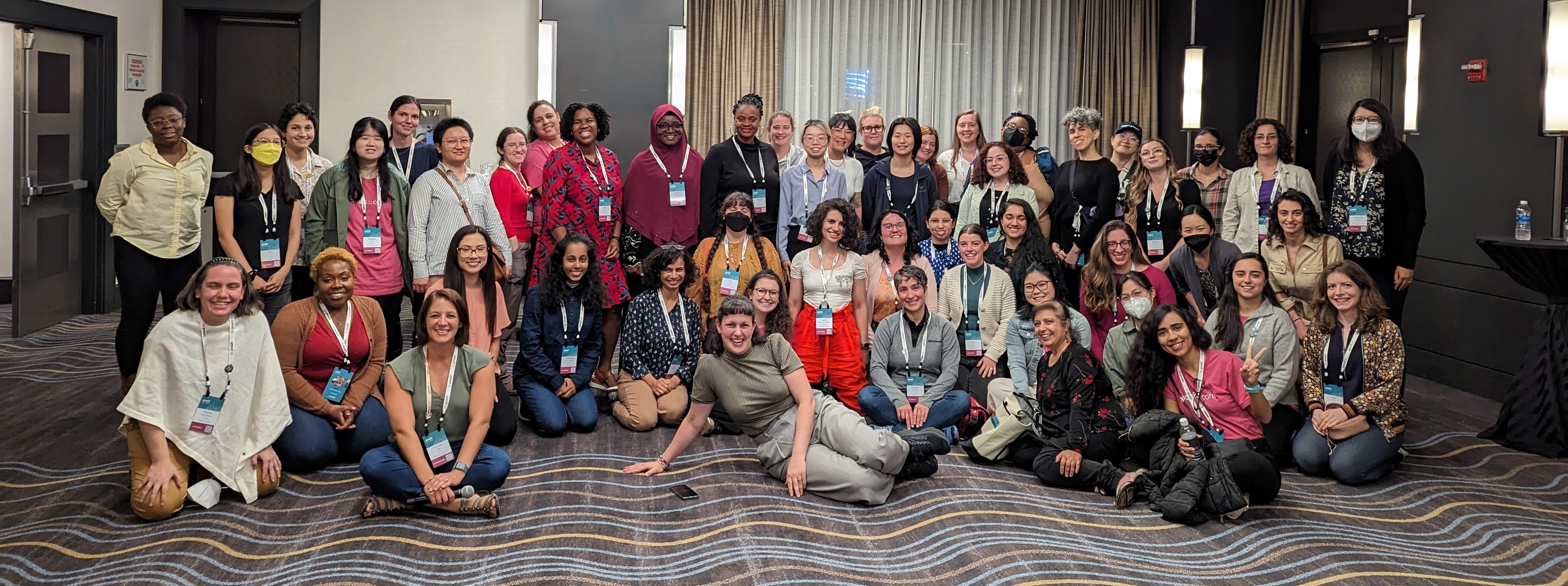 RLadies+ community members gathered at the Posit Conf 2023 reception in Chicago