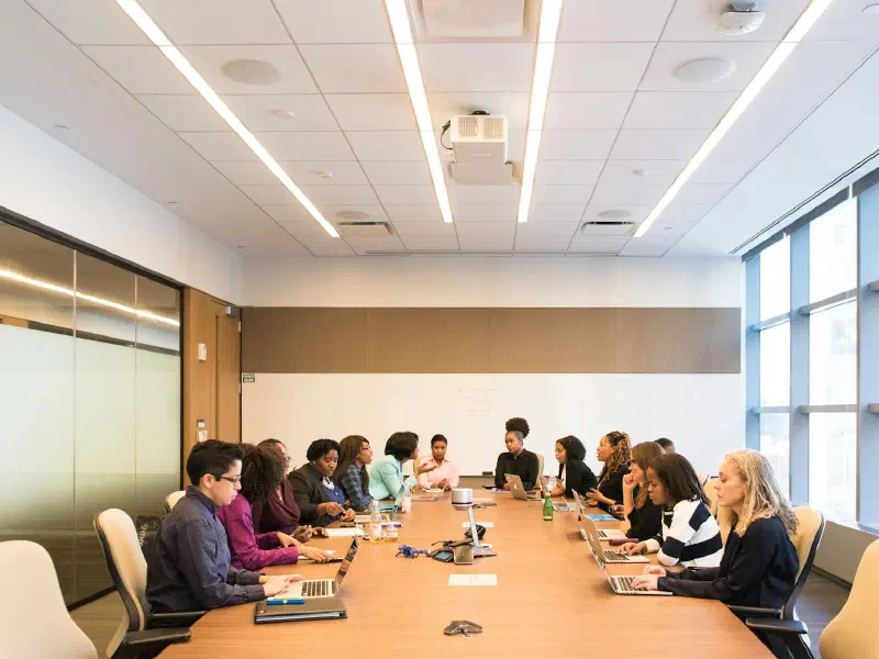 Multicultural team brainstorming in a conference room