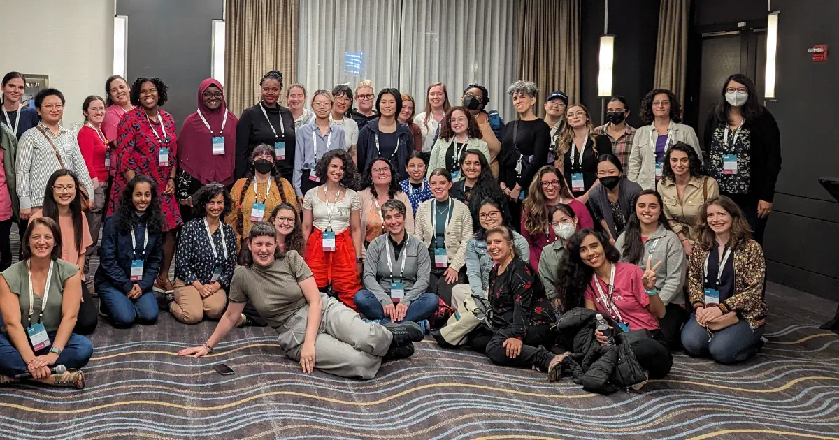 R-Ladies community members gathered in a room of the Hyatt in Chicago at the conclusion of the Q&A session.