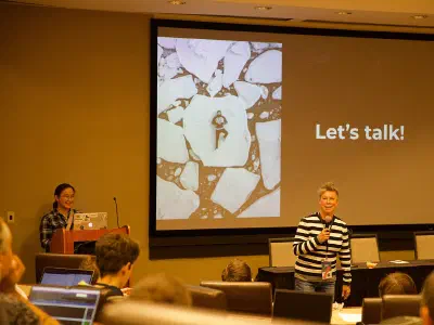 Two people having a conversation at a table
