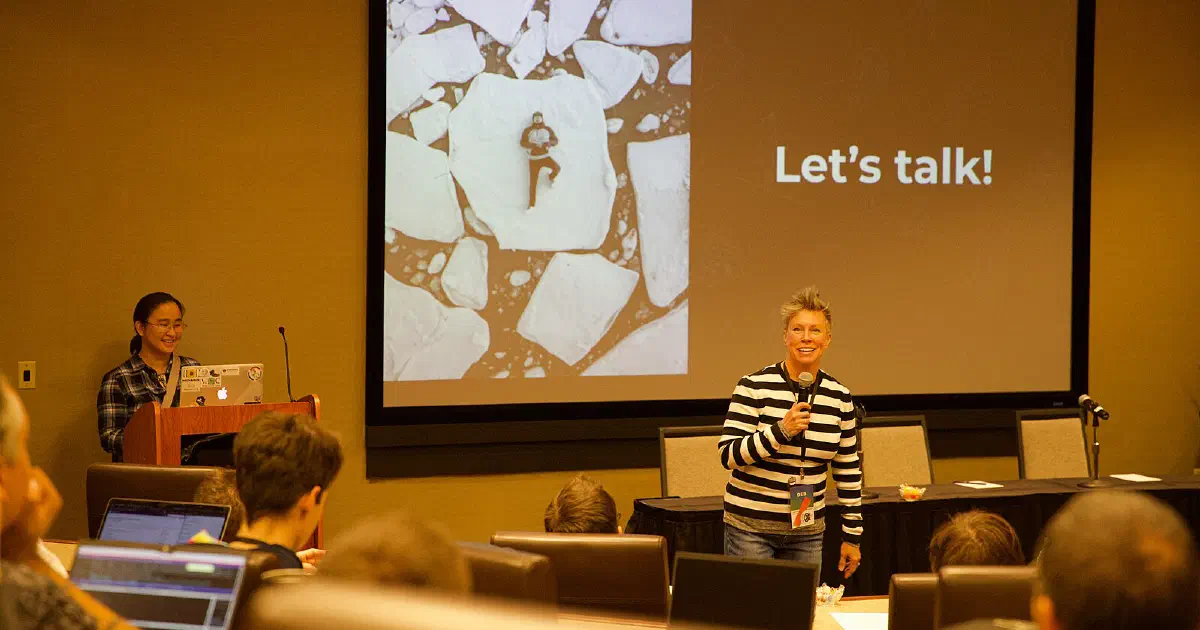 Two people having a conversation at a table